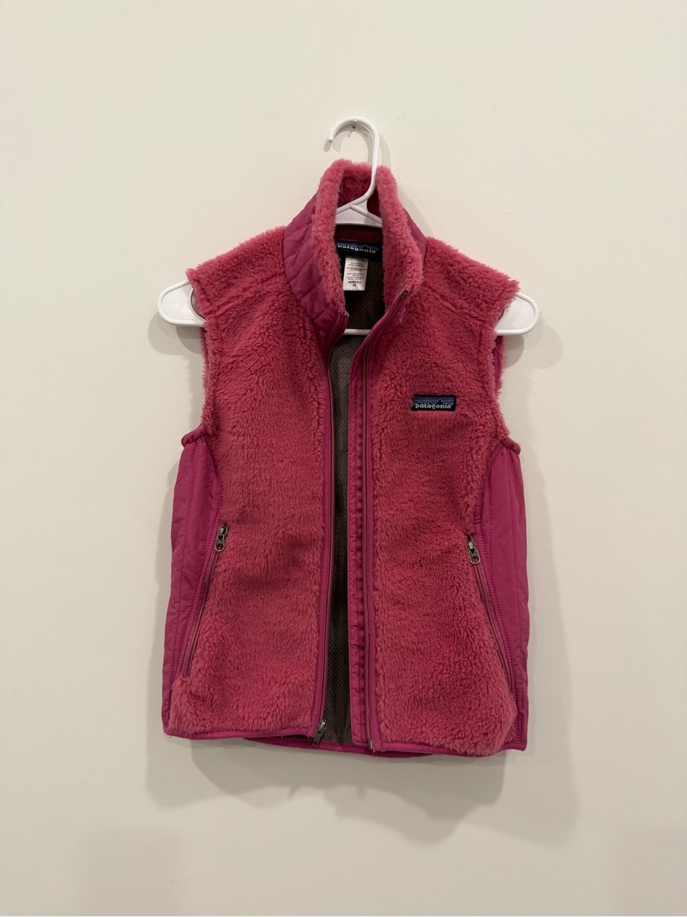 Patagonia women's label in pink fuzzy garment